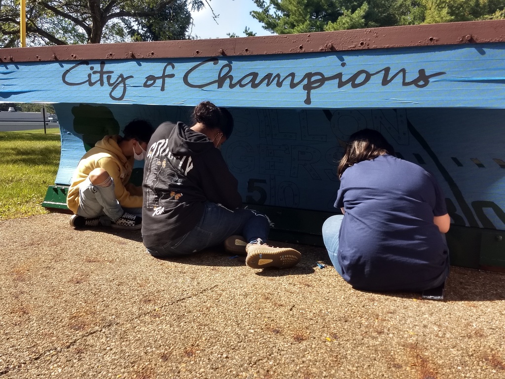 students painting